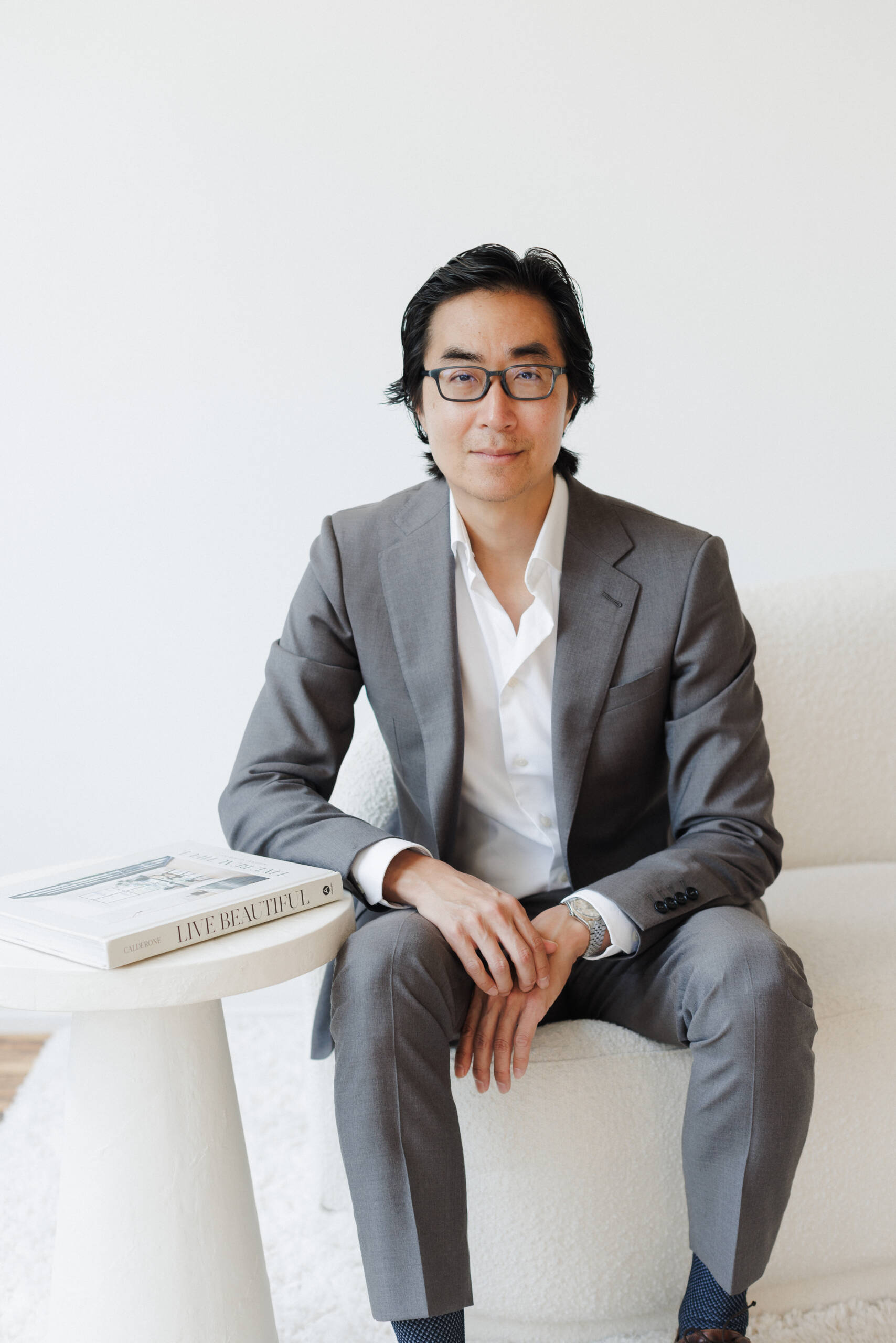 portrait of Dr. Michael J Lee sitting in a chair